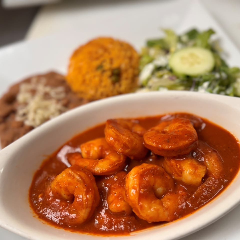Ruben's Mariscos and Mexican Grill's camarones a la diabla with rice, beans, and salad.